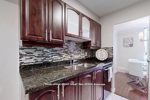 703-90 Ling Rd, Toronto, ON - Indoor Photo Showing Kitchen With Double Sink