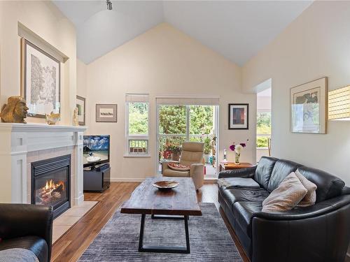 308-5625 Edgewater Lane, Nanaimo, BC - Indoor Photo Showing Living Room With Fireplace