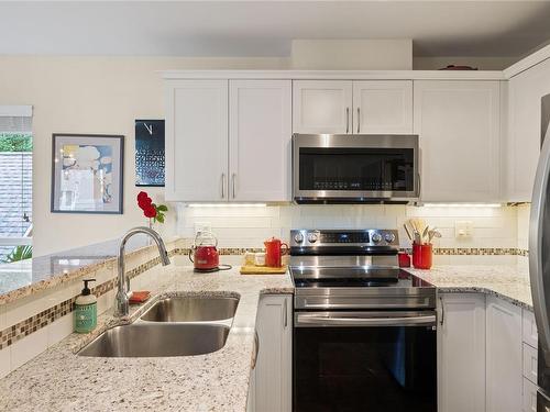 308-5625 Edgewater Lane, Nanaimo, BC - Indoor Photo Showing Kitchen With Double Sink