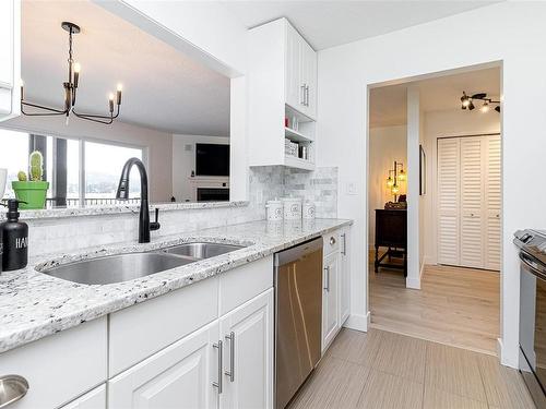 201-1991 Kaltasin Rd, Sooke, BC - Indoor Photo Showing Kitchen With Double Sink With Upgraded Kitchen