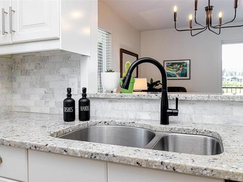 201-1991 Kaltasin Rd, Sooke, BC - Indoor Photo Showing Kitchen With Double Sink