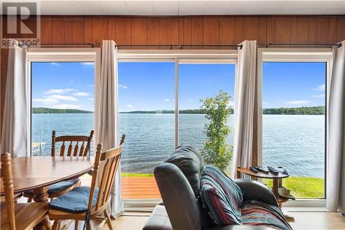 16 Twin Bay, Front Of Yonge, ON - Indoor Photo Showing Dining Room With Body Of Water