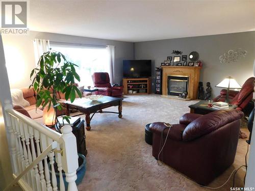 254 2Nd Avenue E, Gravelbourg, SK - Indoor Photo Showing Living Room With Fireplace