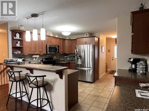 11 Fairway Court, Meadow Lake, SK - Indoor Photo Showing Kitchen With Stainless Steel Kitchen