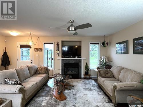 11 Fairway Court, Meadow Lake, SK - Indoor Photo Showing Living Room With Fireplace