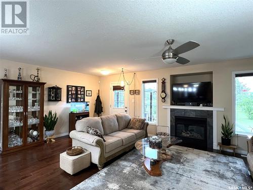 11 Fairway Court, Meadow Lake, SK - Indoor Photo Showing Living Room With Fireplace