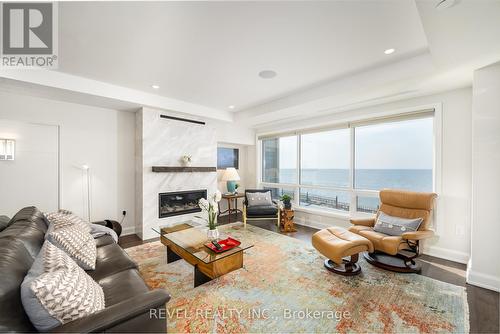 102 - 10 Dalhousie Avenue, St. Catharines, ON - Indoor Photo Showing Living Room With Fireplace