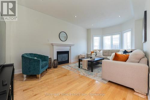 4 Janetville Street, Brampton (Bram East), ON - Indoor Photo Showing Living Room With Fireplace