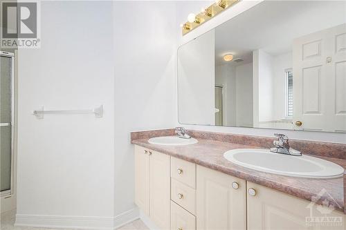 Ensuite bathroom, double sinks, plenty of storage. - 34 Stonemeadow Drive, Ottawa, ON - Indoor Photo Showing Bathroom