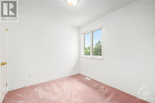 Bedroom 3, 2 double closets. - 34 Stonemeadow Drive, Ottawa, ON - Indoor Photo Showing Other Room