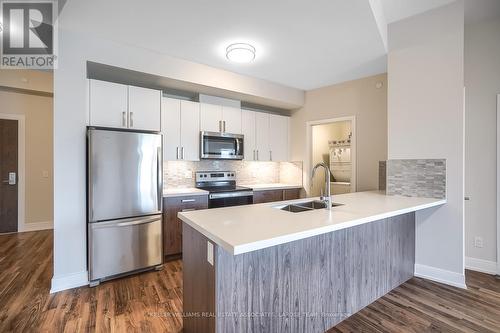 213 - 270 Lakeshore Road W, Mississauga, ON - Indoor Photo Showing Kitchen With Double Sink