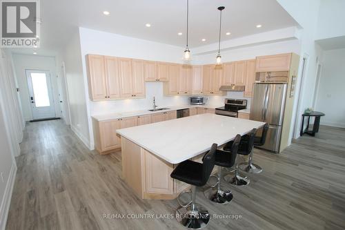 130 Baker Boulevard, Kawartha Lakes, ON - Indoor Photo Showing Kitchen With Stainless Steel Kitchen With Upgraded Kitchen