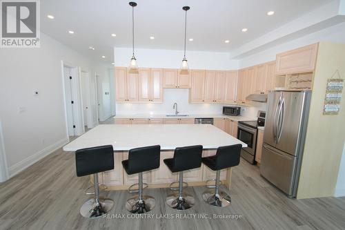 130 Baker Boulevard, Kawartha Lakes, ON - Indoor Photo Showing Kitchen With Stainless Steel Kitchen With Upgraded Kitchen