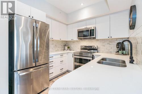 603 - 302 Essa Road, Barrie (400 West), ON - Indoor Photo Showing Kitchen With Double Sink With Upgraded Kitchen