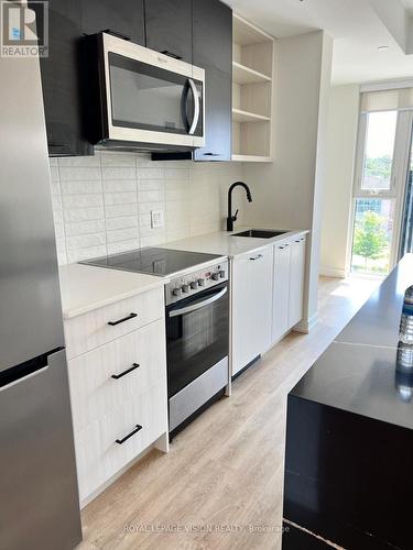 430 - 2300 St Clair Avenue W, Toronto (Junction Area), ON - Indoor Photo Showing Kitchen With Upgraded Kitchen