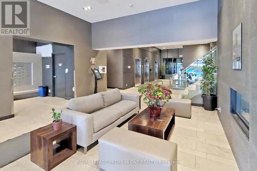 416 - 1940 Ironstone Drive, Burlington (Uptown), ON - Indoor Photo Showing Living Room With Fireplace