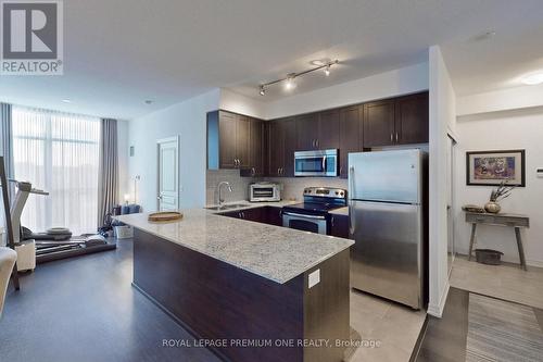 416 - 1940 Ironstone Drive, Burlington (Uptown), ON - Indoor Photo Showing Kitchen With Stainless Steel Kitchen With Double Sink