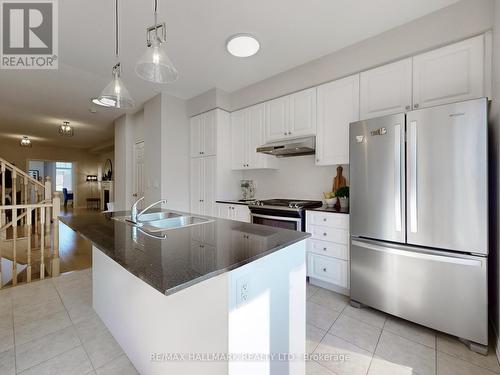 3962 Thomas Alton Boulevard, Burlington (Alton), ON - Indoor Photo Showing Kitchen With Stainless Steel Kitchen With Double Sink With Upgraded Kitchen