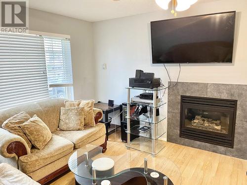 1813 Gorse Street, Prince George, BC - Indoor Photo Showing Living Room With Fireplace