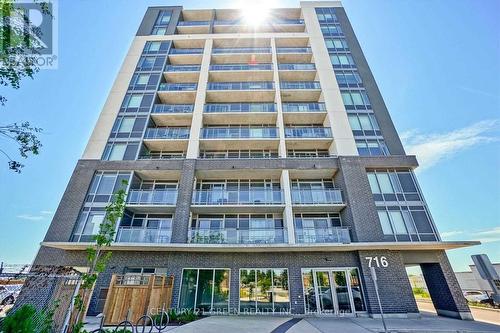 402 - 716 Main Street E, Milton, ON - Outdoor With Balcony With Facade