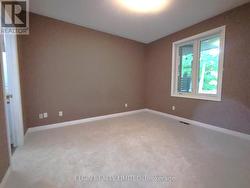 Master Bedroom--window onto covered deck - 