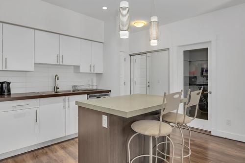 214-975 Academy Way, Kelowna, BC - Indoor Photo Showing Kitchen With Double Sink