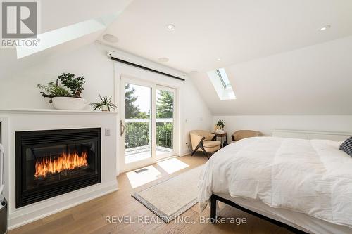 698 Rye Street, Niagara-On-The-Lake, ON - Indoor Photo Showing Bedroom With Fireplace