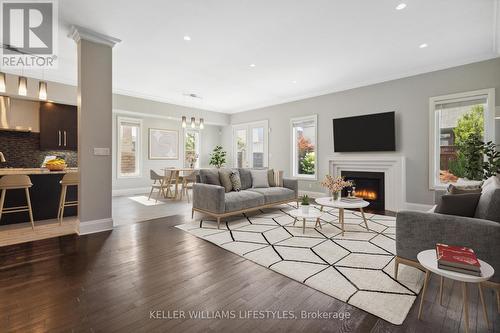 6630 Upper Canada Crossing, London, ON - Indoor Photo Showing Living Room With Fireplace