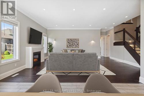 6630 Upper Canada Crossing, London, ON - Indoor Photo Showing Living Room With Fireplace