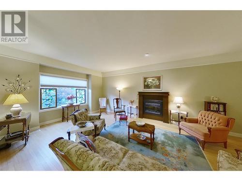 881 16 Street Ne Unit# 7, Salmon Arm, BC - Indoor Photo Showing Living Room With Fireplace