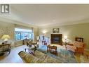 881 16 Street Ne Unit# 7, Salmon Arm, BC  - Indoor Photo Showing Living Room With Fireplace 