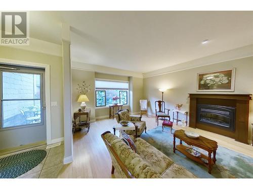 881 16 Street Ne Unit# 7, Salmon Arm, BC - Indoor Photo Showing Living Room With Fireplace