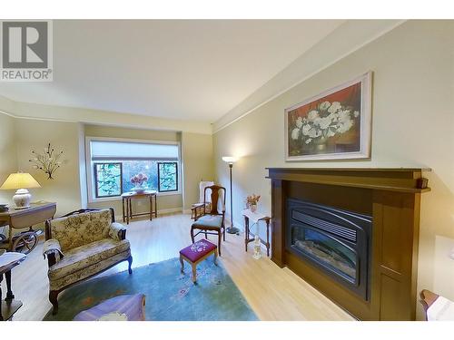 881 16 Street Ne Unit# 7, Salmon Arm, BC - Indoor Photo Showing Living Room With Fireplace