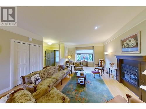 881 16 Street Ne Unit# 7, Salmon Arm, BC - Indoor Photo Showing Living Room With Fireplace