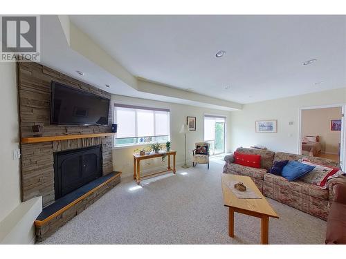 881 16 Street Ne Unit# 7, Salmon Arm, BC - Indoor Photo Showing Living Room With Fireplace