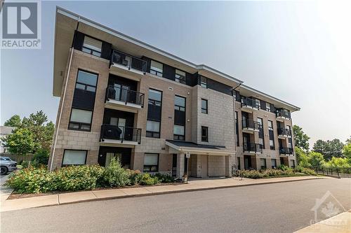 225 Winterfell Private Unit#104, Gloucester, ON - Outdoor With Balcony With Facade