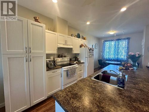 1617 88 Avenue Unit# 801, Dawson Creek, BC - Indoor Photo Showing Kitchen With Double Sink