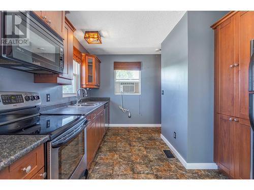 2500 45Th Avenue, Vernon, BC - Indoor Photo Showing Kitchen With Double Sink