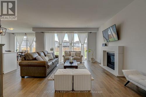 1318 Red Pine Crossing, London, ON - Indoor Photo Showing Living Room With Fireplace