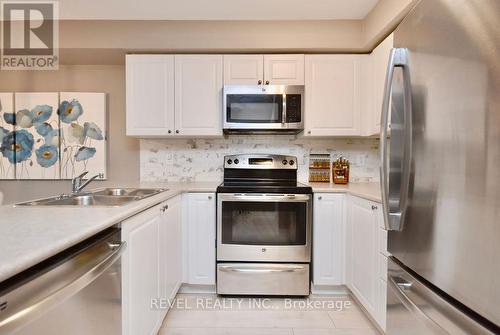 11 - 53 Ferndale Drive S, Barrie (Ardagh), ON - Indoor Photo Showing Kitchen With Double Sink