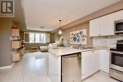 11 - 53 Ferndale Drive S, Barrie (Ardagh), ON - Indoor Photo Showing Kitchen With Double Sink