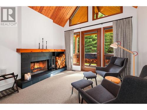 4785 Airport Way, Revelstoke, BC - Indoor Photo Showing Other Room With Fireplace