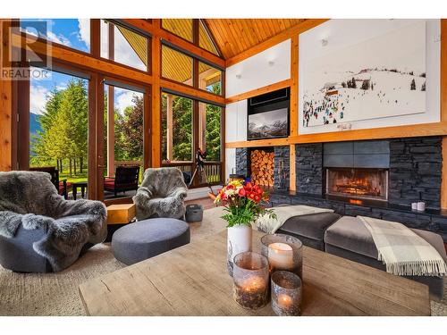 4785 Airport Way, Revelstoke, BC - Indoor Photo Showing Living Room With Fireplace