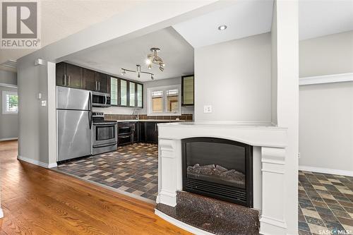 1188 Duffield Crescent, Moose Jaw, SK - Indoor Photo Showing Kitchen With Fireplace