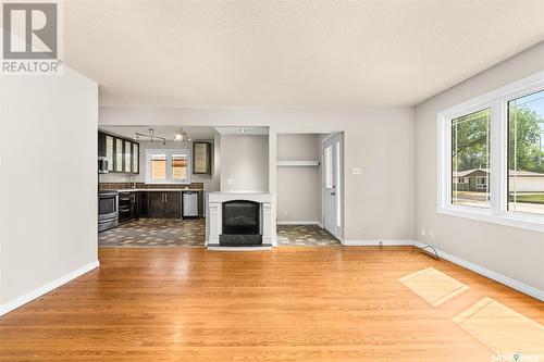 1188 Duffield Crescent, Moose Jaw, SK - Indoor Photo Showing Other Room With Fireplace