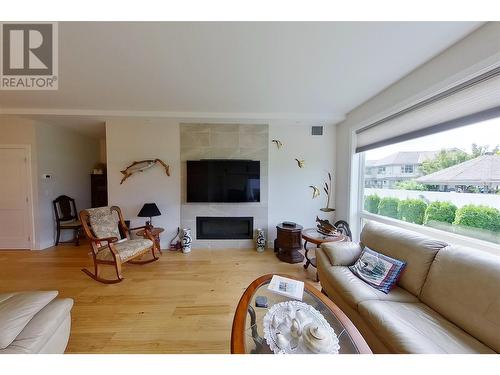 121 Harbourfront Drive Ne Unit# 3, Salmon Arm, BC - Indoor Photo Showing Living Room With Fireplace