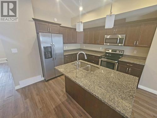 8711 82 Street, Fort St. John, BC - Indoor Photo Showing Kitchen With Double Sink With Upgraded Kitchen