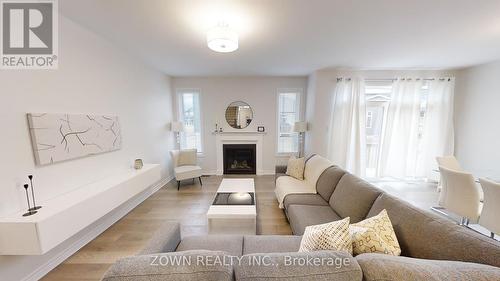 396 Ventoux Avenue, Ottawa (Cumberland), ON - Indoor Photo Showing Living Room With Fireplace