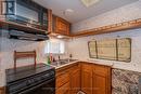 51 - 5216 County 90 Road, Springwater, ON  - Indoor Photo Showing Kitchen With Double Sink 