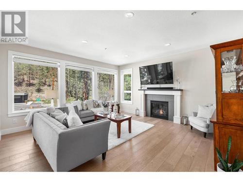 9142 Heritage Drive, Lake Country, BC - Indoor Photo Showing Living Room With Fireplace